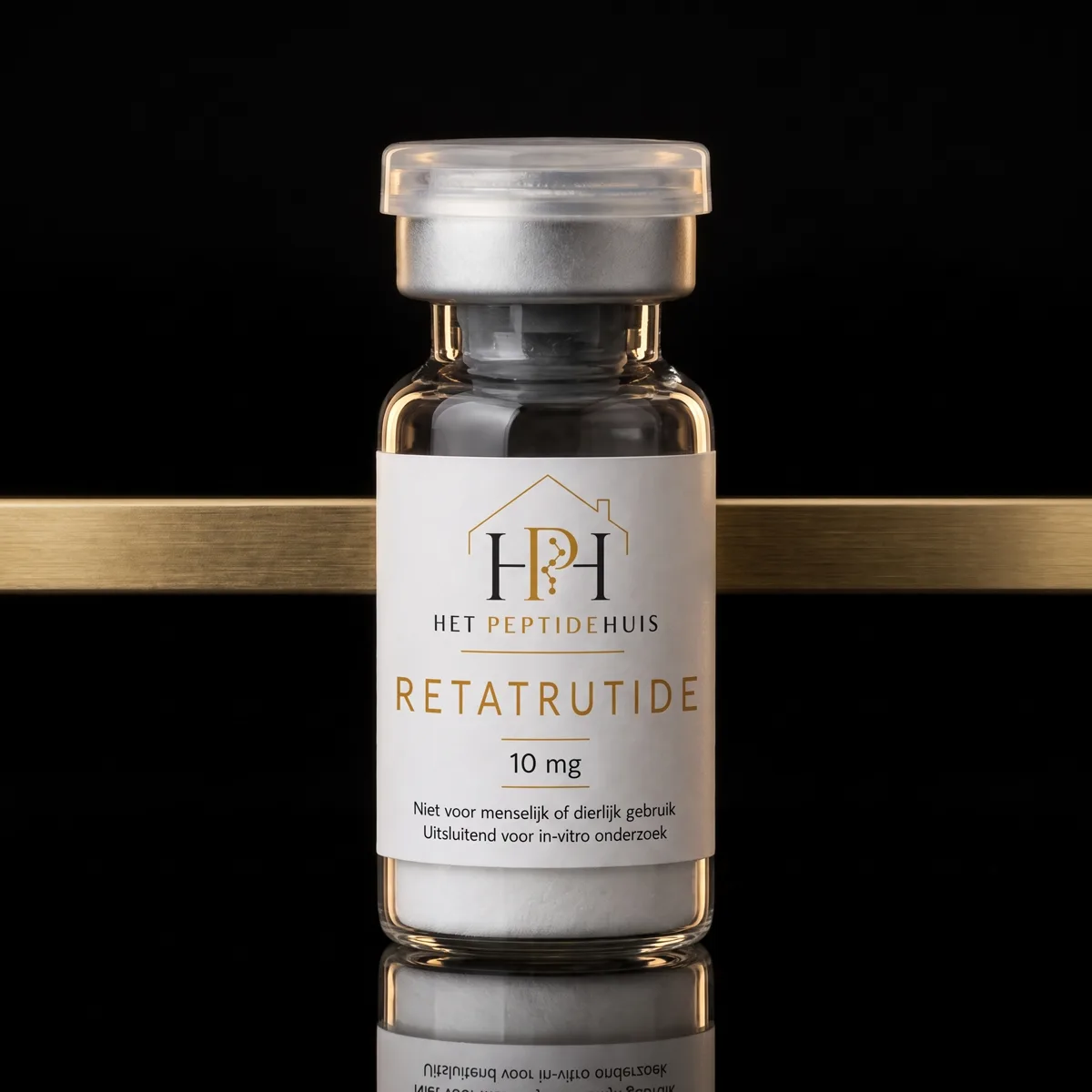 Verzegelde vial naast een gouden accentbalk
